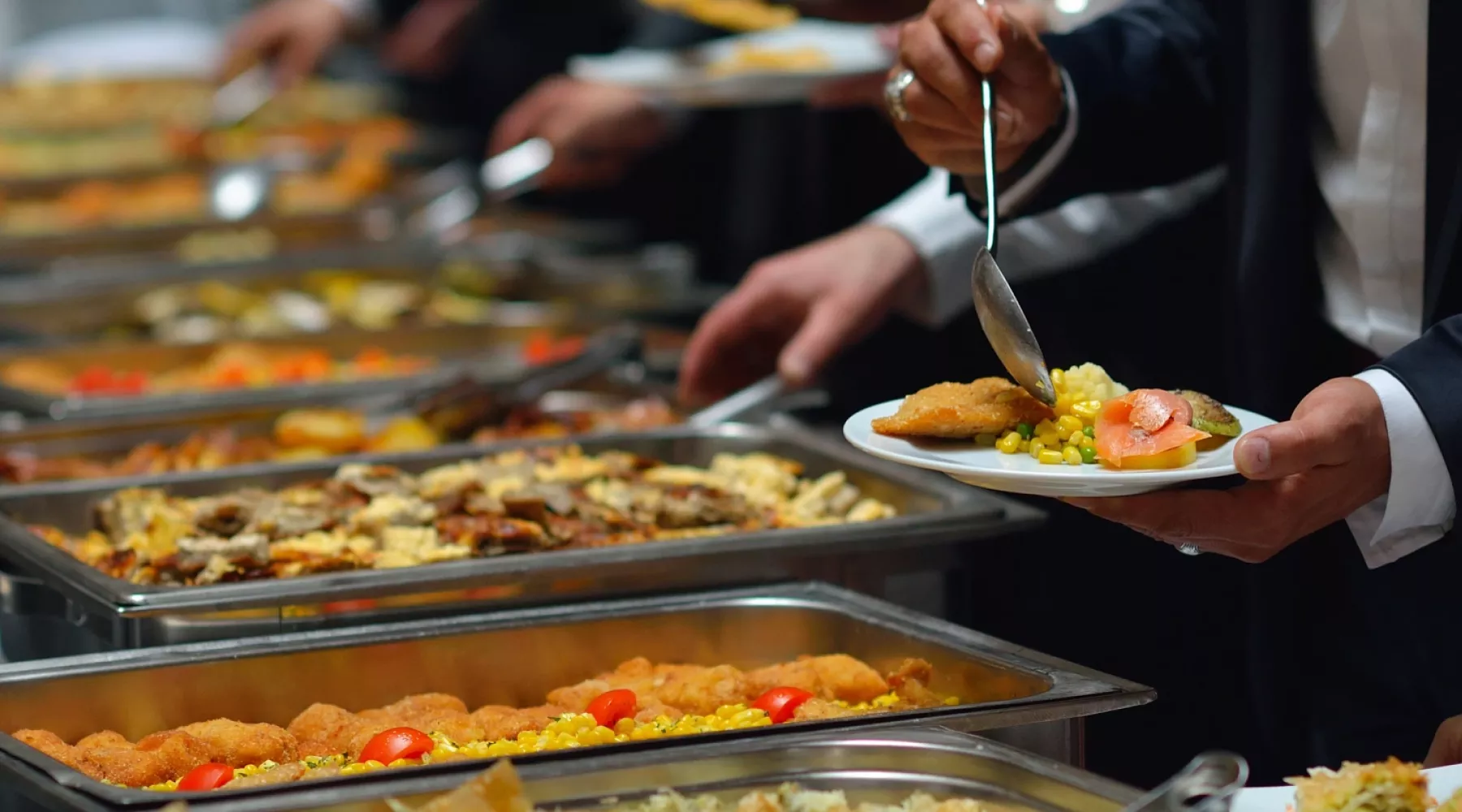 Close up of food in a buffet line setup