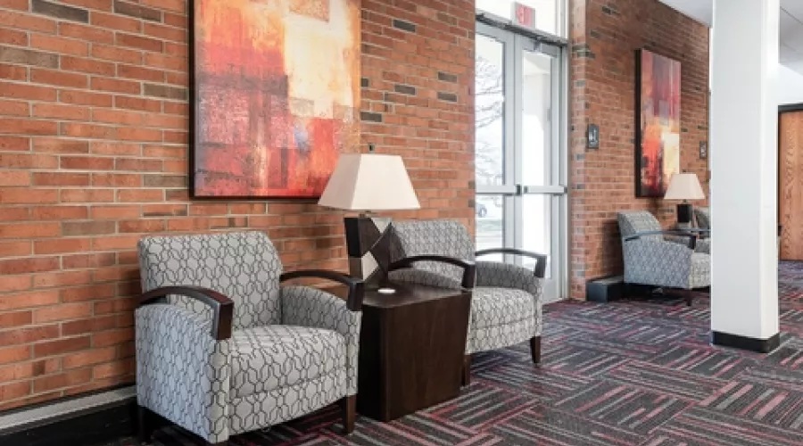 Chairs and side tables in lobby
