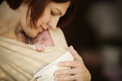 Mother holding a newborn baby