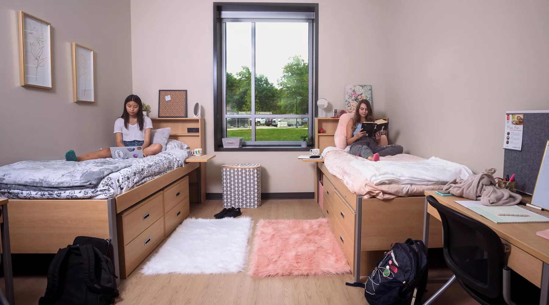 Two students studying the Belknap Village residence hall