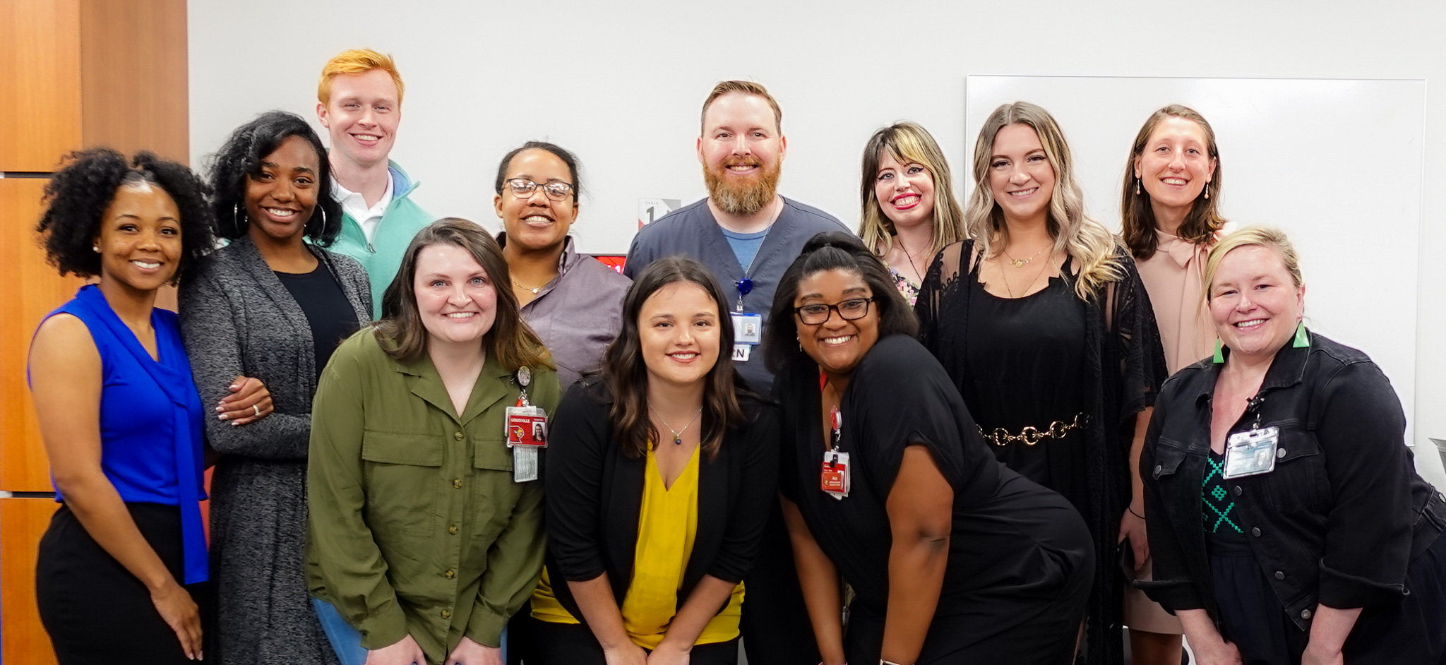 Group photo of nursing students in a classroom setting.
